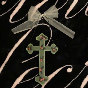 Cross with hook attached